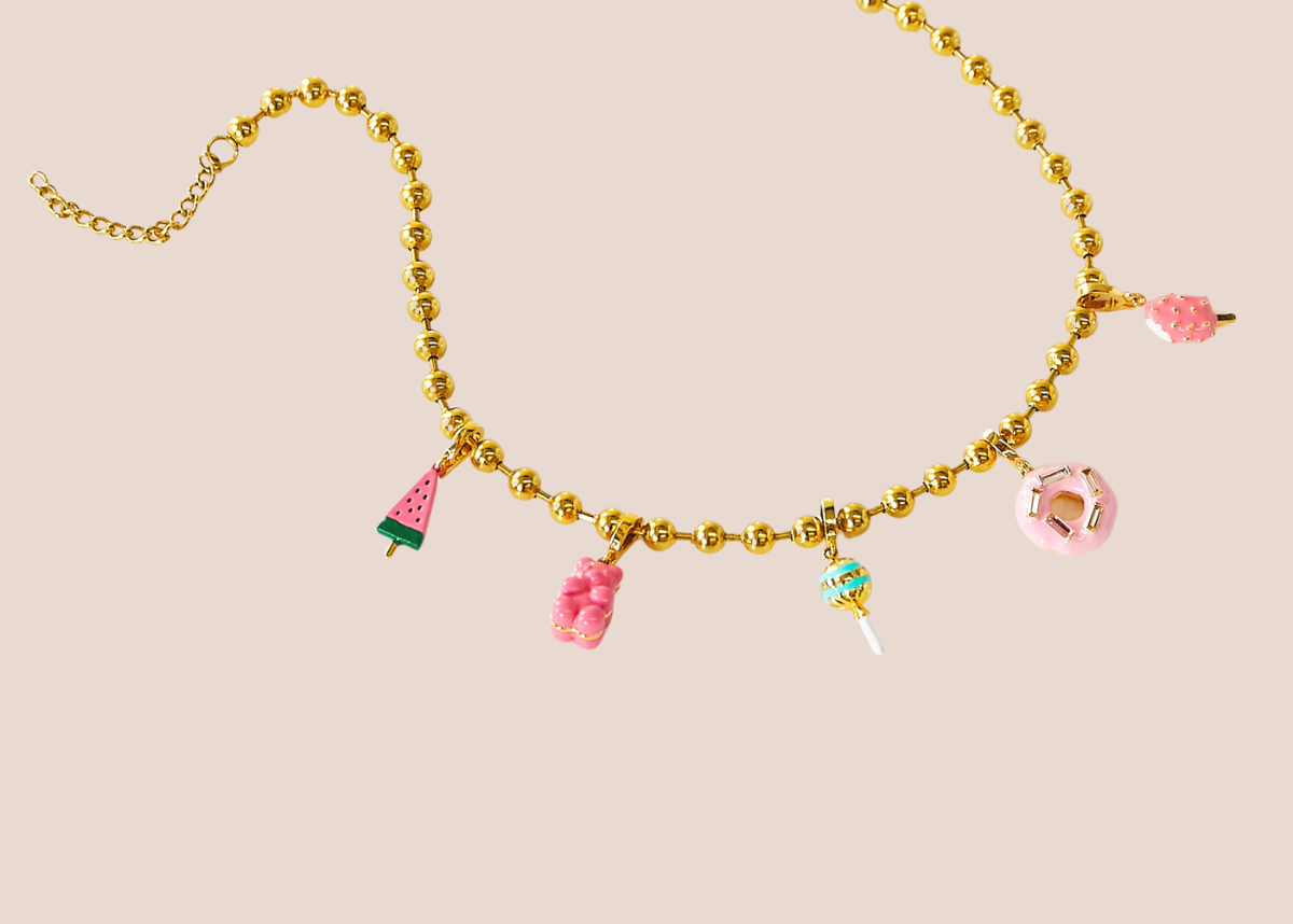 Gold bead necklace with colorful charms