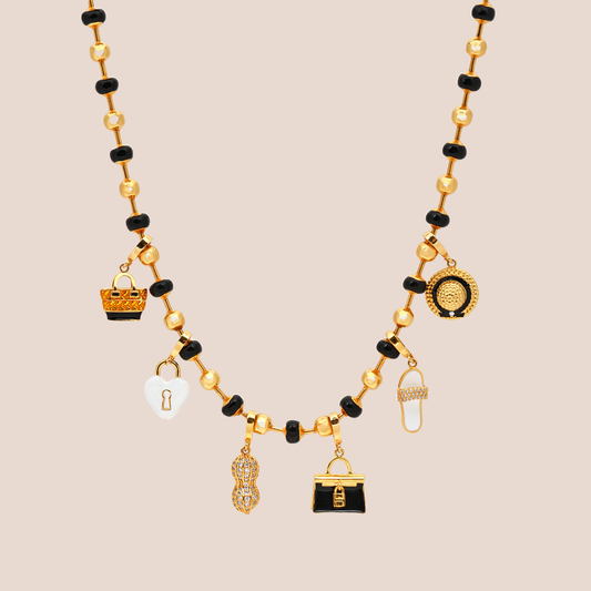 audacious necklace in black, product image with charms