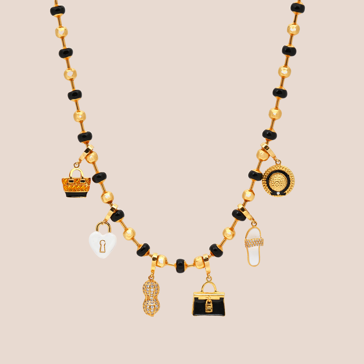 audacious necklace in black, product image with charms