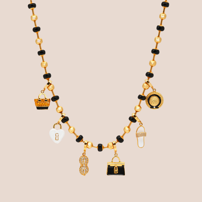 audacious necklace in black, product image with charms